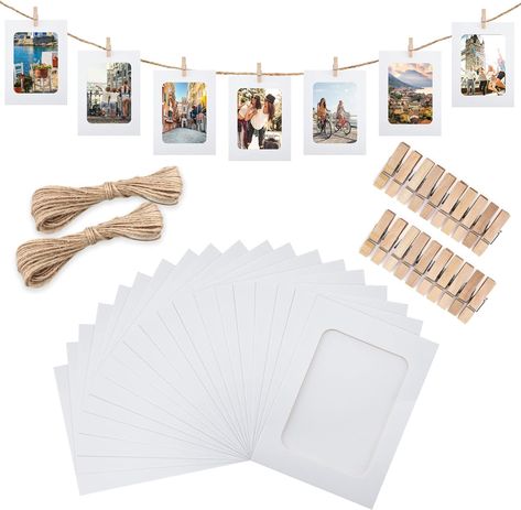 The set includes 20pcs paper photo frames, 2 pieces of twine, and 20pcs wooden clips. Each frame measures 4x6 inches(10x15cm), internal size (display area): is 3.1x4.3 inches( 7.9x11cm). 2 pieces of jute twine are included, each measuring 6.7ft(2m) (total 13ft). The size of the wooden photo holder is 1.3x0.35x0.2inch. suitable for photo decoration of each scene. Paper Picture Frames, Clip Picture Frame, Twine Diy, Office Party Decorations, Display Banners, Picture Frame Shop, Paper Photo, Hanging Frames, Photo Display