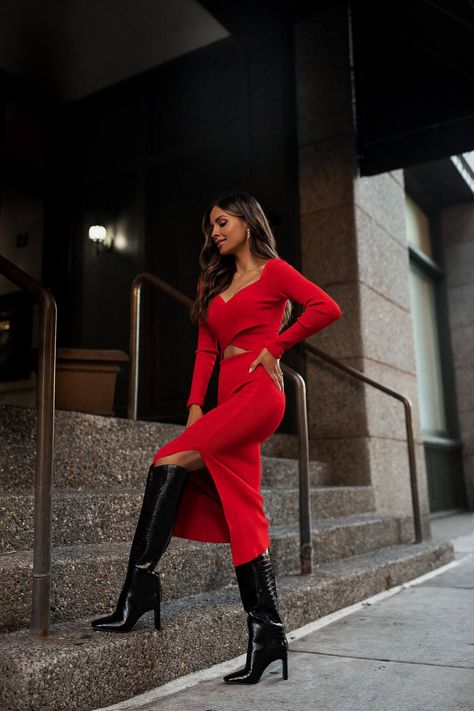 fashion blogger mia mia mine wearing a red matching knit set with knee high boots from express. this is the perfect holiday outfit for parties, dinner dates and more. #datenight #matchingset #falloutfit #style Red Outfit Women, Red Knit Dress Outfit, Red Dinner Outfit, Red Dress Black Boots, Red Dress Winter, Red Dress Winter Outfit, Red Sweater Dress Outfit, Red And Black Outfits For Women, All Red Outfit