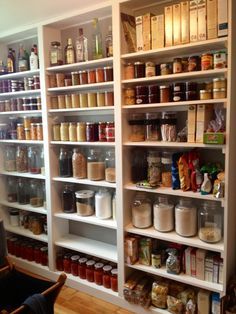 Custom pantry wall in my laundry room, buit by my husband and father-in-law. The majority of the produce seen here was grown organically in our backyard and canned in our kitchen. Narrow Pantry, Laundry Room Pantry, Dream Pantry, Pantry Laundry Room, Wall Storage Shelves, Pantry Laundry, Pantry Room, Custom Pantry, Desain Pantry