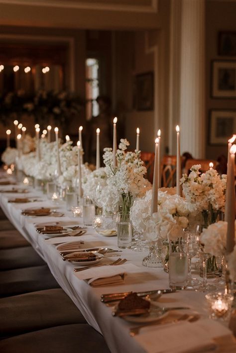 White Hydrangea Tablescape, White Wedding Flowers Hydrangeas, Wedding Table Setting With Candles, Wedding Dinner Candles, Formal Dinner Table Setting Decor, Elegant Wedding Tablescapes, Long Dinner Table Decor, All White Floral Centerpieces, White Flowers And Candles Centerpieces