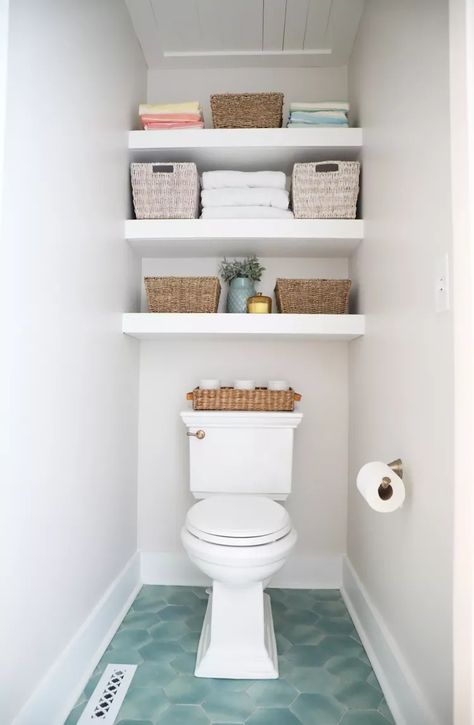 21 Small Bathroom Ideas With a Big Impact Toilet Room Organization Ideas, Over Toilet Linen Storage, Toilet Area Storage, Over The Toliet Storage, Bathroom Shelving Ideas For Towels, Bathroom Storage Shelves Over Toilet, Toilet Room Shelving, Bathroom Storage No Closet, Towel Storage Above Toilet