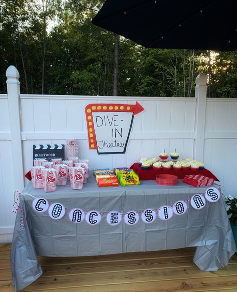 Pool Movie Birthday Party, At Home Concession Stand Movie Nights, Yard Movie Night Ideas, Dive In Movie Party, Outdoor Movie Pool Party, Lawn Movie Night Party Ideas, Movie Pool Party Ideas, Kids Movie Party Ideas, Movie Party Concession Stand