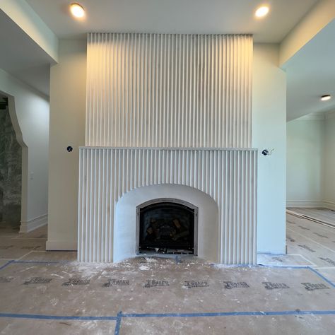 Plaster Fluted Fireplace, Curved Fireplace Wall, Assymetrical Fireplace Wall Ideas, Reeded Wood Fireplace, Tambour Fireplace, Diy Fluted Fireplace Surround, Rendered Fireplace, Raked Plaster Fireplace, Fluted Fireplace Surround