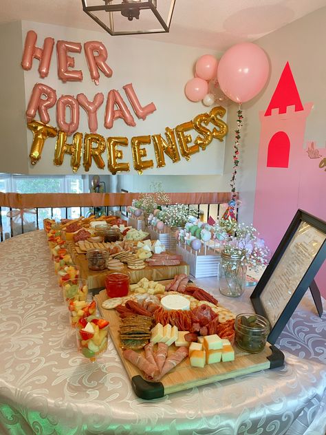 Princess party decor with snack table and Her Royal Threeness balloons. Small 3rd Birthday Party Ideas, Princess Food Ideas, Birthday Party Snack Table, Princess Brunch, Princess Birthday Party Food, Threenager Party, Party Snack Table, Princess Party Decor, Princess Party Food