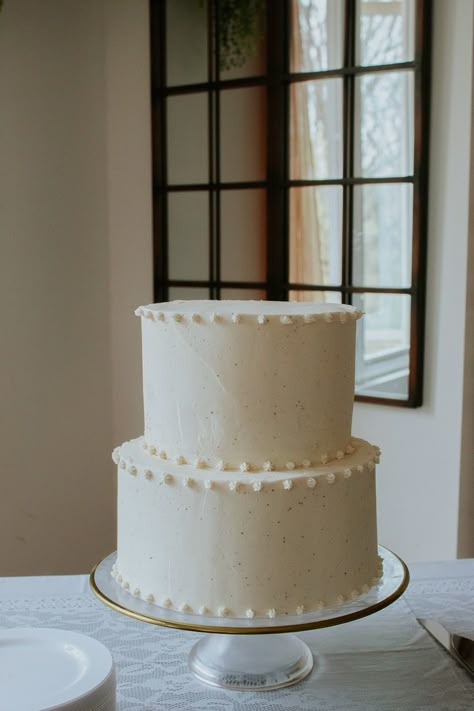 Wedding inspo, weddings, chic wedding, ideas, elegant wedding, white cake, pretty, small wedding cake, traditional cake, modern wedding, wedding decor, green and white Small Traditional Wedding Cakes, Simple Wedding Cake Small Two Tier, Plane White Wedding Cake, Two Tiered Simple Wedding Cake, Minimal Icing Wedding Cake, Basic Wedding Cake Simple, Simple Cakes Wedding, Wedding Cake Ideas Elegant Simple, Simple Piped Wedding Cake