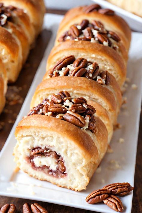 Pecan Cream Cheese Rolls Recipe

Ingredients

- 1 package (8 oz) cream cheese, softened
- 1/2 cup butter, softened
- 1 cup sugar
- 1 teaspoon vanilla extract
- 1 package (1 lb) refrigerated crescent roll dough
- 1 cup chopped pecans
- 1/2 cup brown sugar
- 1 teaspoon ground cinnamon
- 1/4 cup maple syrup

Full Cooking Instructions on... Small Nut Rolls, Cream Cheese Rolls Recipe, Cheese Rolls Recipe, Cream Cheese Dough, Cheese Dough, Nut Rolls, Dinner Ideas Recipes, Cheese Rolls, Cream Cheese Rolls