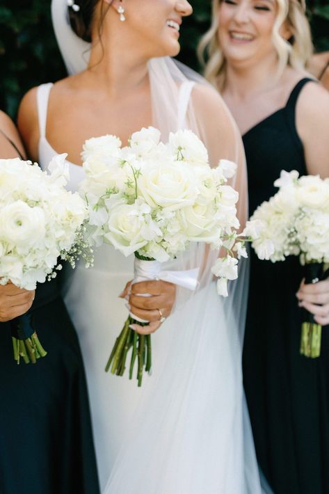 All white bride and bridesmaid bouquet for trendy and modern summer Newport wedding at Belle Mer. Photography By Halie | Boston and New England Photographer Bride And Bridesmaid Bouquets White, Classic Bridesmaid Bouquet, White Bridal Party Bouquets, Bridesmaid White Bouquet, White Roses Bridesmaid Bouquet, Bridesmaids Bouquets Simple, White Bouquet Wedding Bridesmaid, All White Bridesmaid Bouquet, Wedding Bouquets Bride White