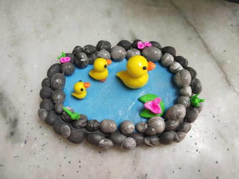 Made from air dry clay Fimo, Polymer Clay Lily Pad, Clay Duck Pond, Air Dry Clay Garden Ideas, Air Dry Clay Duck, Diy Clay Home Decor, Air Dry Clay Frog, Clay Pond, Ducks In A Pond