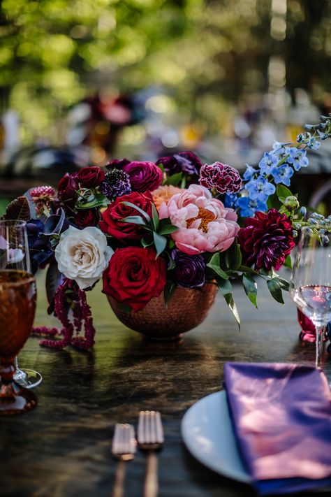 Lush jewel toned wedding centerpiece features peonies, roses, dahlias, and more for a Houdini Estate wedding reception by Winston and Main. Colorful Flowers Centerpieces, Fall Wedding Ideas Centerpieces, Jewel Tone Vintage Wedding, Jewel Tone Wedding Flowers Centerpieces, Jewel Tone Flowers Wedding, Jewel Tone Floral Arrangements, Wedding Flowers Jewel Tones, Cheap Wedding Flower Ideas, Jewel Tone Wedding Bouquet