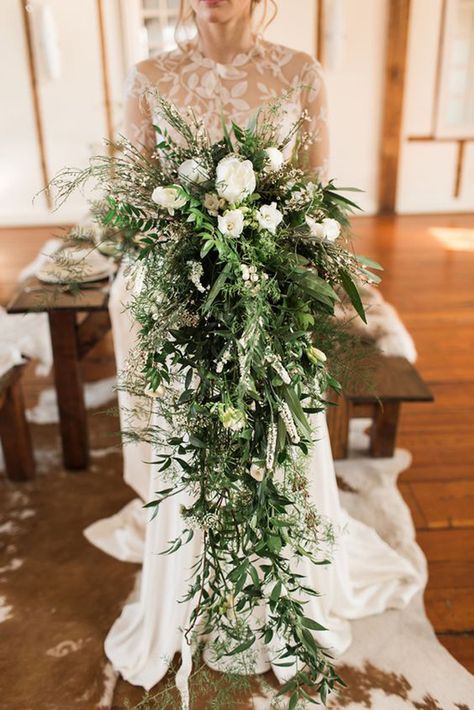 Gorgeous Cascading Wedding Bouquets ❤ See more: http://www.weddingforward.com/cascading-wedding-bouquets/ #weddings Sage Green And Navy Blue Bridal Bouquet, Forest Themed Wedding Bouquet, Flowy Bouquet, Bouquets Ideas, Greenery Wedding Bouquet, Highlands Wedding, Wedding Plants, Cascading Bridal Bouquets, Cascading Wedding Bouquets