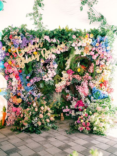 A colorful floral filled dream! | floral inspiration, floral summer, floral decor, flower decorations, floral wall, birthday floral decoration, floral party decorations, floral styling, floral party,planner,decor planner, event planner, event stylist,birthday party, birthday party ideas, party idea,kids party, fun birthday, colorful birthday party,party decorations ideas, decorations party, decor birthday, birthday ideas party, wedding planner #kidsbirthday #birthdayparty #partytheme #floralwall Photowall Ideas Party, Bunny Burrow, Floral Photo Booth, Garden Backdrop, Photowall Ideas, White Wedding Ceremony, Floral Party Decorations, Garden Backdrops, Colorful Birthday Party