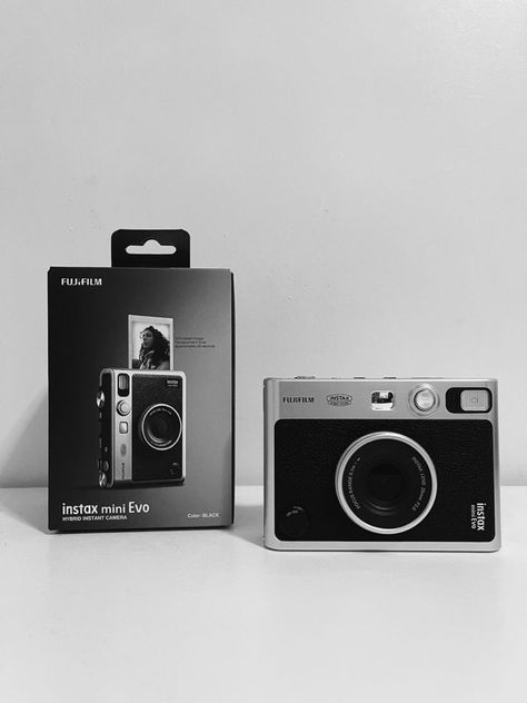 a photo of a film camera, the instax mini evo Instax Evo Camera, Polaroid Mini Evo, Fujifilm Instax Evo, Instax Mini Evo Camera Aesthetic, Insta Mini Evo, Instax Mini Evo Photo, Fujifilm Instax Mini Evo Aesthetic, Instax Evo Mini, Instead Mini Evo