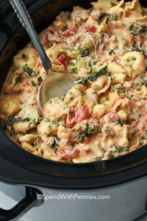 This creamy crockpot tortellini is an easy cheesy pasta dish! Made with sausage, cream cheese, and frozen tortellini it is simple to prepare and makes the most delicious supper with little effort. #spendwithpennies #creamycrockpottortellini #creamytortellini #slowcookerrecipe #crockpotrecipe #pastadish #creamypastasauce Tortellini Crockpot, Tortellini Recipes Crockpot, Pasta With Cream Cheese, Lazy Crock Pot Lasagna, Crock Pot Pasta, Crockpot Tortellini, Crock Pot Tortellini, Cheese Tortellini Recipes, Sausage Crockpot