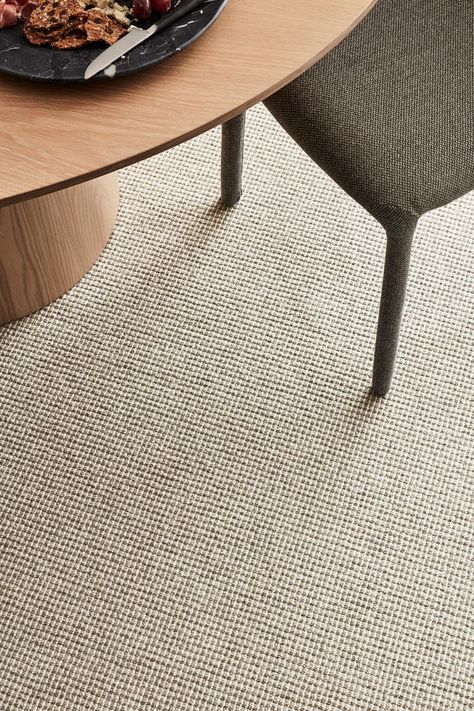 Bring the luxury of wool carpet to your family home. Woven with a multilevel loop pile, Bainbridge boasts the benefits of wool and features a subtle lineal pattern that adds depth to its design. Available in a versatile range of neutral shades to suit any interior, it’ll bring a pleasing feel to living areas and bedrooms alike. Styling - Bree Leech. Photography - Mike Baker Wool Carpet Living Room, Japandi Carpet, Carpet Flooring Bedroom, Wool Loop Carpet, Lounge Carpet, Grey Carpet Living Room, Loop Pile Carpet, Round Room, Wool Rugs Living Room