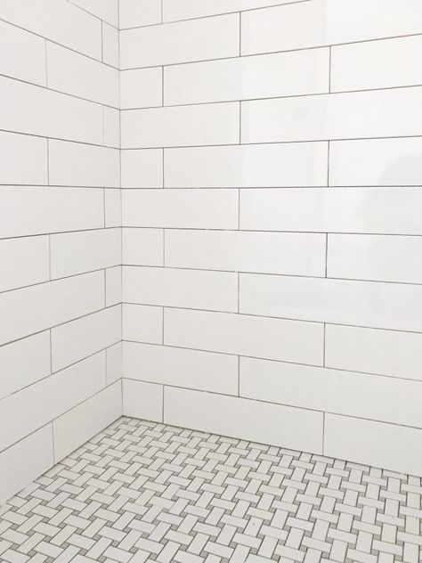 Love the subway tile and basketweave floor with more of a gray vs a black. Too much for whole bath floor? Maybe just shower floor and insets? Basketweave Tile Bathroom, Beach House Bathrooms, White Subway Tile Shower, Subway Tile Showers, Beach House Bathroom, Subway Tiles Bathroom, House Bathrooms, Young House, Shower Floor Tile