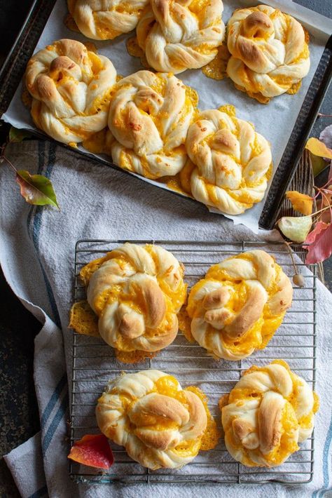 Giant Cheddar Twists are made with a buttery, soft dough filled and twisted with cheese to form a knot that oozes out of each roll.  These large rolls are great served with soup and perfect to dip into a hot bowl of chili. I bet you can't each just one! March Recipes, April Recipes, September Recipes, October Recipes, Gingerbread Hot Chocolate, Cabbage Wraps, Harvest Bread, Chocolate Drop Cookies, Sour Cream Sugar Cookies