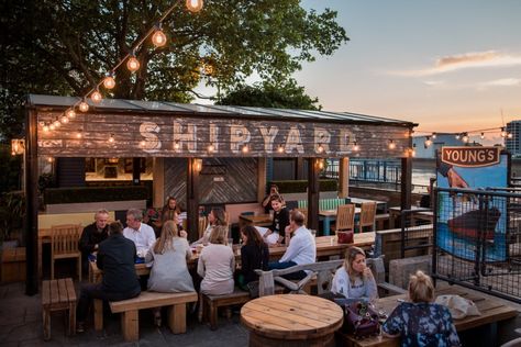 10 of the Best Beer Gardens in London | Best Beer in London | Best Pubs Decked Garden, Beer Garden Ideas, Outdoor Seats, Gourmet Burger, Burger Menu, London Fields, Riverside House, Best Pubs, Beer Pub