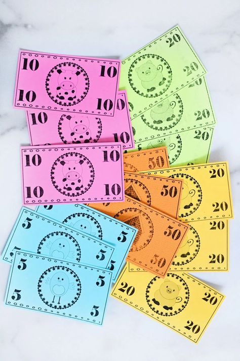 Download this free printable play money for all your games nights, kids playdates or make our adorable DIY game night party garland with it. So many fun ideas for this cute printable play money. #freeprintable #gamenight #playmoney #DIypartyideas #pinkpeppermintdesign Printable Play Money Template Free, Play Money Printable Free, Diy Game Night, Free Printable Play Money, Play Money Template, Home And Family Crafts, Printable Play Money, Game Night Party, Game Money