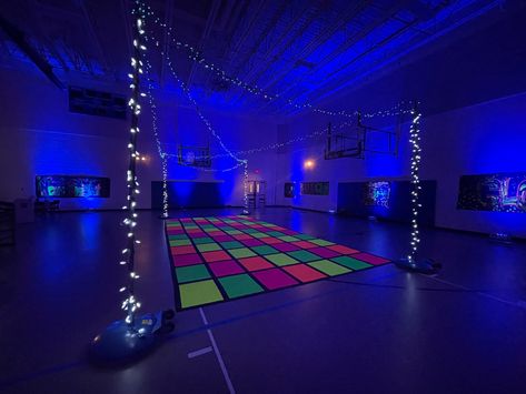 Glow Party Dance Floor, Decades School Dance Theme, Middle School Glow Dance, Middle School Dance Decor, Decorating A Gym For A Party, Glow School Dance, Neon School Dance, Spring Dance Themes, Middle School Dance Themes