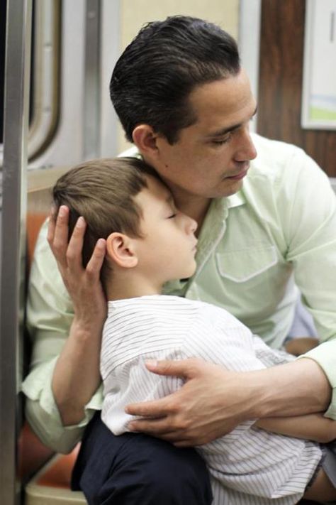 This photo was taken around midnight on a Brooklyn-bound C Train. The son was sprawled out on his father’s lap, sleeping. The father was cradling the boy’s head in his hands. It was a pretty touching scene, and I wanted to photograph it, but I was very tired myself and I wasn’t sure how much I’d be able to capture from such a close distance. Then suddenly, the father lifted his son into a sitting position, and leaned in so they were touching faces. Humans Of New York, Very Tired, The Father, The Boy, His Hands, Train, New York