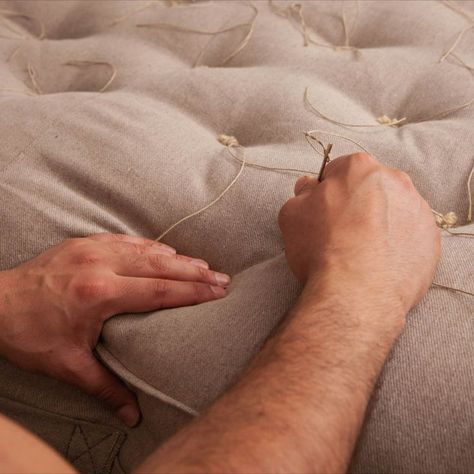 What is tufting for? Tufting your cushion or mattress is accomplished by sewing buttons or stitches through them. The technique ensures that the wool filling is distributed evenly and doesn't move. Our skilled artisans make each tuft by hand and carefully calculate its position to provide you with a more comfortable sleeping surface. By holding the filling in place, tufting will also prolong the product's life. Good news is tufting makes the product look very elegant. Victoria Era, Diy Mattress, Tufted Furniture, Wool Mattress, Cushions To Make, Tufted Cushion, Sewing Buttons, Sleep Comfortably, Photo Session