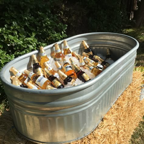 Our galvanized water trough makes for the perfect drink cooler Backyard Wedding Cooler Ideas, Galvanized Tub For Drinks At Wedding, Galvanized Tub Drink Station, Beer Tubs For Wedding, Stock Tank Drink Cooler, Stock Tank Cooler Wedding, Water Trough Cooler Wedding, Water Trough Drink Cooler, Wedding Beer Trough