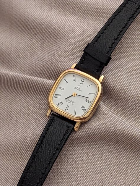 Vintage Omega Deville, Swiss made quartz watch, gold case, black leather band. Art deco inspired, Roman numeral dial. #omega Omega Deville, Band Art, Vintage Omega, Roman Numeral, Art Deco Inspired, Gold Case, Roman Numerals, Swiss Made, Leather Band