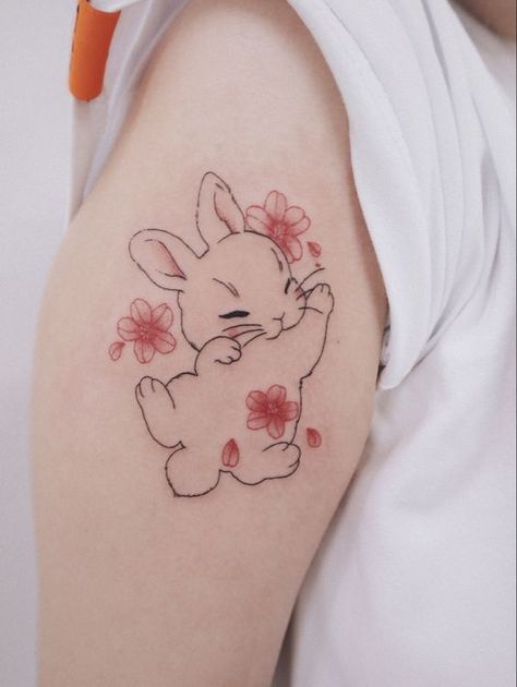 Rate This Tattoo ideas From ⭐1~10. SAVE & FOLLOW i will update everyweek. Bunny With Fairy Wings Tattoo, Chinese Bunny Tattoo, Edgy Bunny Tattoo, Bunny With Flowers Tattoo, Cute Rabbit Tattoo, Bunny Tattoo Design, Cherub Tattoo Designs, Fairy Wing Tattoos, Cute Halloween Tattoos