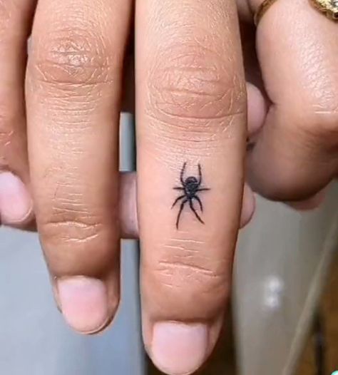 Hand On Neck Tattoo, Spider On Finger Tattoo, Spider Tattoo On Finger, Goth Hand Tattoos Men, Black Widow Finger Tattoo, Finger Tattoos Side Of Finger, Finger Spider Tattoo, Eyeball Finger Tattoo, Spider Web Tattoo On Hand