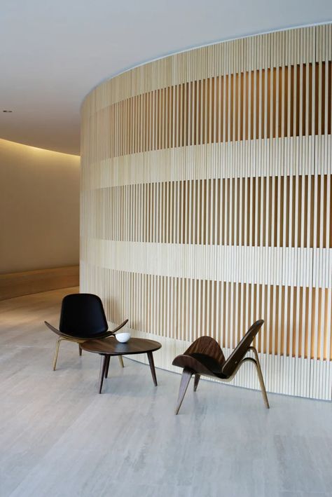 John Pawson · Hotel Puerta América, Reception Desk and Meeting Rooms · Divisare Old House Interior, John Pawson, Hotel Reception, Curved Walls, Timber Cladding, Lobby Design, Meeting Rooms, Alvar Aalto, Wooden Slats