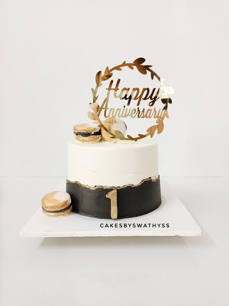 Black and gold anniversary cake Black And Gold Anniversary Cake, 1st Wedding Anniversary Cake Designs, 1st Anniversary Cake Designs, First Anniversary Cake Ideas, First Wedding Anniversary Cake, First Anniversary Cake, Gold Anniversary Cake, 1st Anniversary Cake, Anniversary Cake Designs