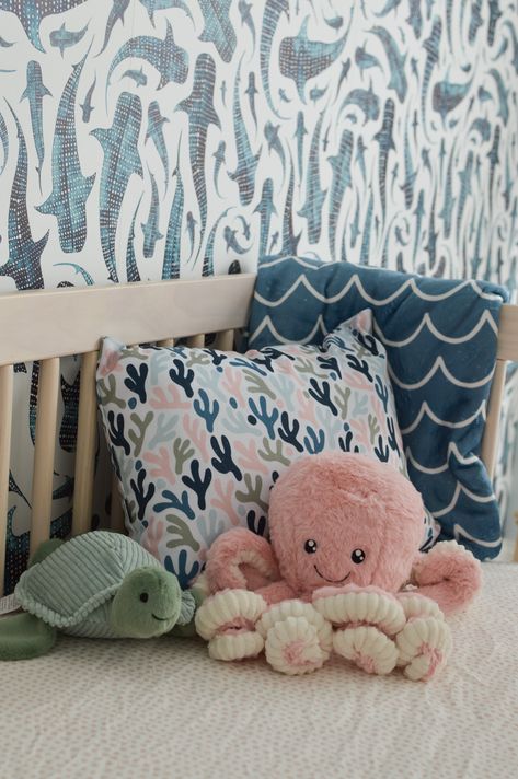 Fun and playful with an elevated feel, this coastal inspired "Under the Sea" nursery is full of patterns and prints that come together for the perfect little girl's nursery! Featuring products from @spoonflower @society6 @babyletto and @potterybarnkids Nursery Themes Under The Sea, Neutral Nursery Theme Ideas, Boho Under The Sea Nursery, Underwater Nursery Theme Girl, Under The Sea Neutral Nursery, Aquatic Themed Nursery, Water Theme Nursery, Girl Under The Sea Nursery, Gender Neutral Ocean Themed Nursery