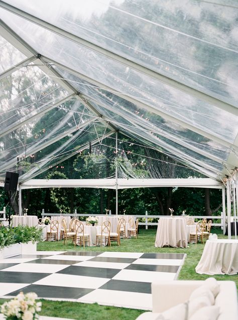 Black and white checkered dance floor and cocktail style seating under a clear top tent Black And White Checkered Floor Wedding, Cocktail Style Wedding, Checkerboard Dance Floor Wedding, Clear Tent Wedding, Black And White Dance Floor Wedding, Checkered Dance Floor, Black And White Dance Floor, Checkered Dance Floor Wedding, Clear Tent Wedding Dance Floor