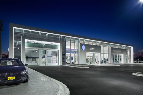 D.J. Kranz | Retail Design | Exterior of Luther Brookdale Volkswagen Car Dealership in Brooklyn Center, MN by D.J. Kranz as the general contractor. #cardealershipdesign #retaildesign #generalcontrator #volkswagen Volkswagen Showroom, Car Dealership Design, Car Detail Shop, Car Showroom Architecture, Vw Taos, Car Showroom Design, Store Architecture, Car Wash Business, Automotive Shops