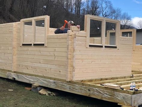 Interlocking corners make the construction robust and easy to assemble. Louisville Do-It-Yourself Log Cabin Kit from EZ Log Structures If you review the plans in advance and lay out the materials, construction should be straightforward. Just be sure to square and level as you go. Building A Log Cabin Diy, Diy Log Cabin Off Grid, Diy Mini Log Cabin, Miniature Log Cabin Diy, Small Log Cabin Kits, Log Cabin Kits Prices, Tiny Log Cabin, Diy Log Cabin, Lake Front House Plans