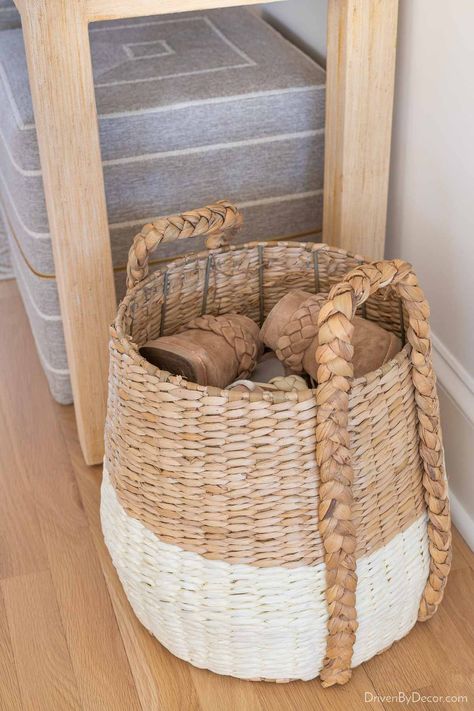 Woven basket filled with shoes Entry Way Shoe Storage Baskets, Entry Shoe Basket, Entryway Basket Storage, Basket Entryway Decor, Shoe Basket By Door Entryway, Baskets For Shoes Entryway, Basket Shoe Storage, Basket Shoe Rack, Entryway Shoe Basket