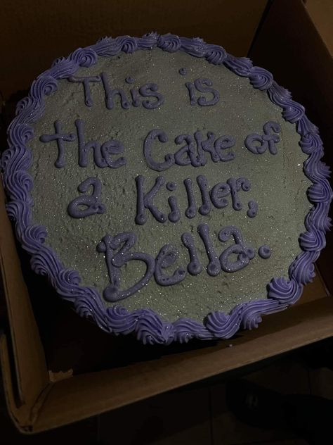 A gray cake with silver sparkles in the icing. In purple frosting, the cake reads, “this is the cake of a killer, Bella.” Twilight Theme Cake, Twilight Desserts, How Long Have You Been 17 Twilight Cake, Twilight Food Ideas, Twilight Party Food, Funny Birthday Cakes For Teens, Twilight Cake Ideas, Twilight Themed Food, Twilight Themed Snacks