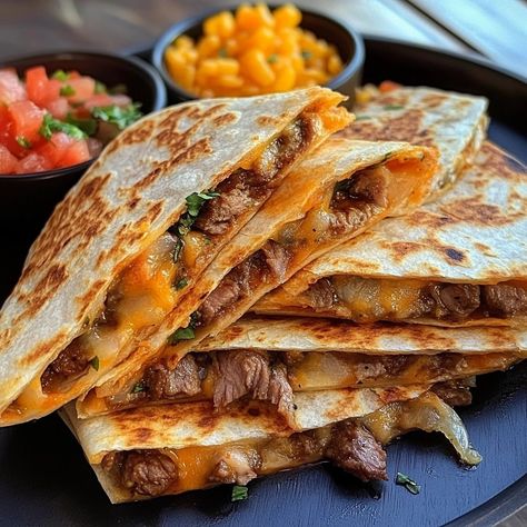 There’s nothing quite like a warm, cheesy Steak Quesadilla to brighten up a weekday evening—or ... Read More Steak Quesadilla Recipe Mexican, Shredded Steak Quesadillas, Oven Quesadilla Recipes, Philly Cheese Steak Quesadilla Recipe, Shaved Steak Quesadilla Recipes, Steak Quesadillas Recipes, Roast Beef Quesadillas, Quesadilla Seasoning Recipe, Steak Quesadilla Recipe Easy