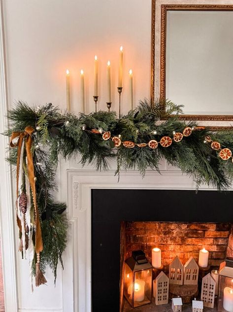 Create a luxe holiday home with these 30 sophisticated Christmas decorating ideas to deck your halls! | Home Made by Carmona #Christmas #decor #holiday #luxe #decorating #holidaydecoratingideas Garage Garland Christmas, Boho Christmas Window Display, Diy Cottage Christmas Decor, Traditional Christmas Decorations Outdoor, Vintage Mantle Christmas Decor, Old World Christmas Mantle, 1800s Christmas Aesthetic, Subtle Holiday Decor, Christmas Mantle 2023