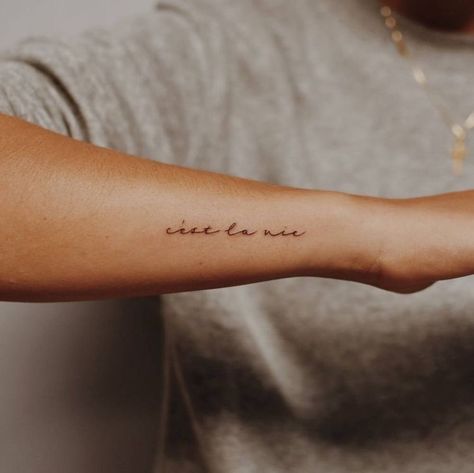 Cursive Tattoo On Wrist, Cest La Vie Tattoo Arm, Wrist Tattoos Writing, Side Wrist Tattoo Words, Tattoo On Side Of Arm, Side Forearm Tattoo Women Quotes, Tattoo Side Of Wrist, Forearm Writing Tattoo, Side Of Forearm Tattoo