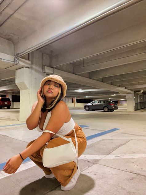 Parking garage photo parking lot cute pose outfit of the day bucket hat white purse nike air force ones corduroy pants Parking Garage Photoshoot, Garage Photoshoot, Cute Pose, Bucket Hat White, White Purse, White Purses, Parking Garage, Nike Air Force Ones, Air Force Ones