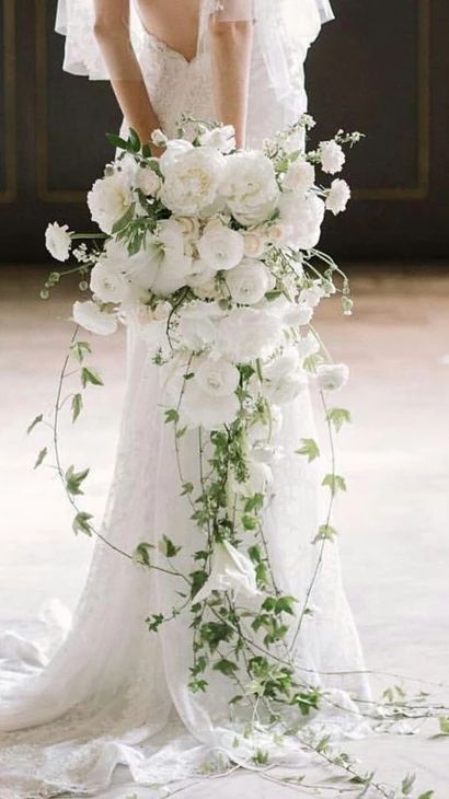 No 3 Long free-flowing cascade | 2022 Wedding Bouquet Trends Greenery Wedding Bouquet, Natural Bouquet, Enchanted Garden Wedding, Cascading Bridal Bouquets, Cascading Wedding Bouquets, Spring Wedding Bouquet, Spring Wedding Flowers, Cascade Bouquet, White Wedding Bouquets