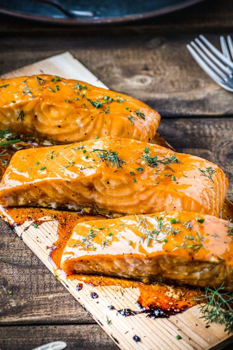 Who doesn’t love the slightly smoky flavor you get from grilled meats and vegetables. One of our favorite recipes is plank-grilled salmon fillets with a flavorful glaze!⁠ ⁠ Our friends at @cooking_with_wine created this recipe for Grilled Salmon with a tasty glaze using our Passion Fruit Purée. The glaze is easy to make and grilling the salmon on a wood plank is even easier! The glaze elevates this salmon for a beautiful presentation for your guests at your dinner event!⁠ Salmon En Salsa, Passion Fruit Sauce, Fruit Glaze, Passionfruit Recipes, Salmon Soy Sauce, Grilled Salmon Recipes, Fruit Sauce, Summertime Recipes, Grilled Meats