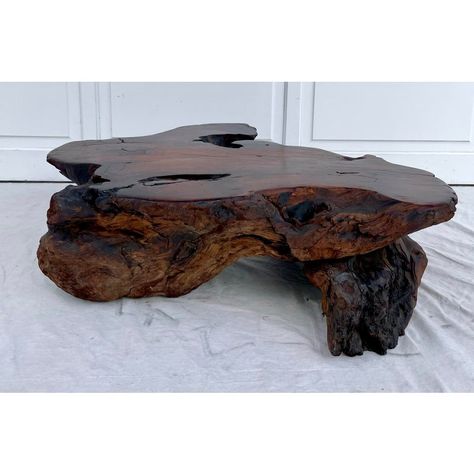 Here is a stunning table that is made from a natural, organic edged wood slab and root pieces.  The top of the table is flat and lacquered, and has a beautiful wood grain design.  I love that this table looks special from every angle!  You can use it as a coffee or side table.  Very sturdy, very solid piece.  When you look below you can see that there are iron supports, hidden from the top.  Nakashima inspired style.  Timeless. Tree Stump Tables, Petrified Wood Side Table, Raw Edge Coffee Table, Earthy Furniture, Rustic Western Living Room, Raw Wood Coffee Table, Nature Furniture, Tree Stump Coffee Table, Wood Table Living Room