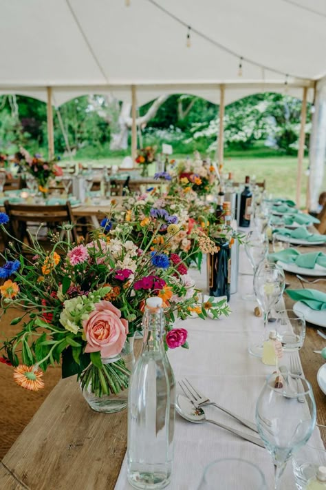 A flower-filled wedding day with bursts of colour at Uphill Farm, as featured in Wed Magazine. #wedmagazine #wedmagazinecornwall #wedmagazinedevon #bride #wedding #weddingplanning #weddinginspiration #weddinginspo #devon #devonbrides #devonbride #devonwedding #devonweddings #weddingdevon #2023bride #2024bride #colourfulwedding #farmwedding #ruralwedding Summer Farm Wedding Colors, English Farm Wedding, Rural Wedding Ideas, British Countryside Wedding, Uk Farm Wedding, Fall Wedding Next Feild, Farm Wedding Marquee, Hardy Farm Wedding, Gedney Farm Wedding