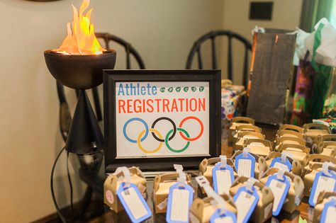 How To Throw An Amazing Olympic Party Olympic Party Food, Beer Olympics Party, Olympic Party Games, Olympic Party Decorations, Summer Olympics Party, Vbs Olympics, Office Olympics, Olympics Decorations, Olympic Theme Party