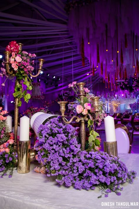 Pink And Purple Event Decor, Wedding Reception Purple Theme, Purple Outdoor Wedding Decor, Purple Sangeet Decor, Purple Flower Decor, Purple Theme Wedding Decorations, Pathway Decor Wedding, Purple Flower Decorations, Purple Decor Wedding