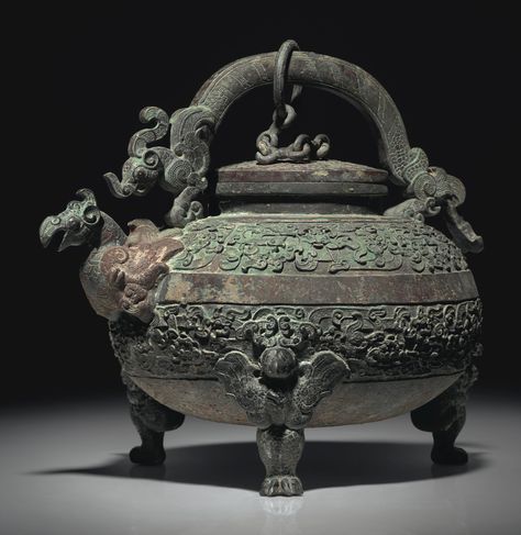 A RARE FINELY CAST TRIPOD EWER AND COVER, HE | WARRING STATES PERIOD (475-221 BC) | bronze, China | Christie's Chinese Sculpture, Zhou Dynasty, Warring States Period, Historical Objects, Chinese Bronze, Chinese Pottery, Chinese Ceramics, China Art, Stone Sculpture