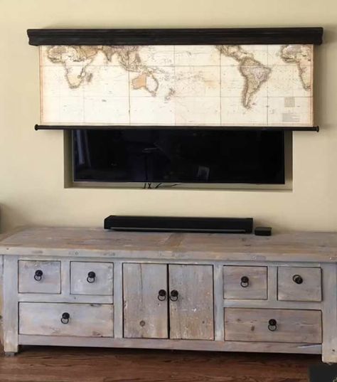 19 Stylish Ways of Cleverly Hiding a TV in a Living Room - Tiny Partments Tv That Comes Up From Table, Tv Cabinet Over Fireplace Hide Tv, Picture Tv Cover Hidden Tv, Flat Screen Tv Above Fireplace, Two Tvs In Living Room, Camouflage Tv On Wall, Ways To Hide Your Tv, Ways To Hide A Tv On The Wall, Hide Tv On Wall Tv Covers