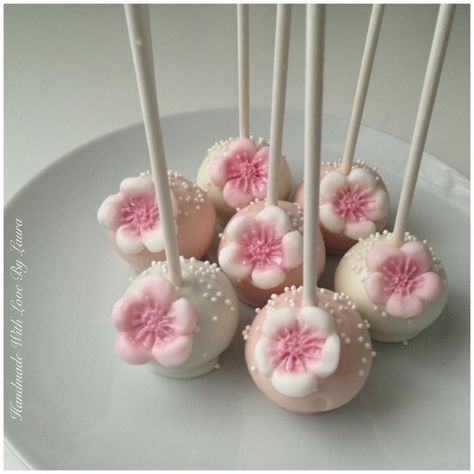 Cherry blossom cake pops handmade by ME :) Cherry Blossom Dessert Table, Cherry Blossom Quince, Cherry Blossom Cake Pops, Cherry Blossom Dessert, Burfee Truffles, Cherry Blossom Cupcakes, Cherry Blossom Baptismal Theme, Cherry Blossom Cake Decoration, Marinette Aesthetic